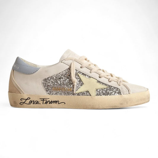 Bio-based Super-Star sneakers with silver glitter and a yellow leather star