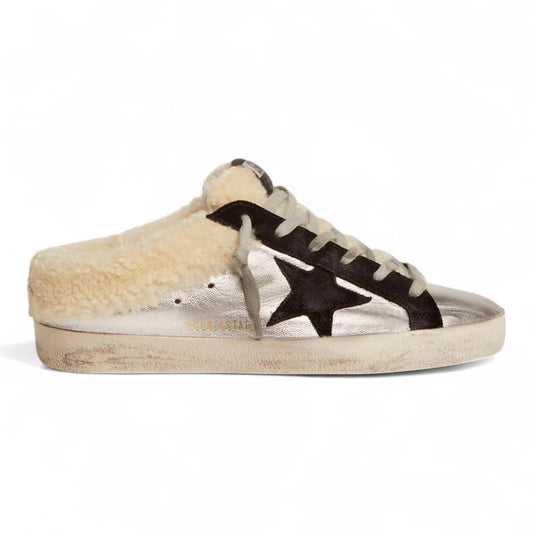 The Super-Star Sabot in silver laminated leather with a black star
