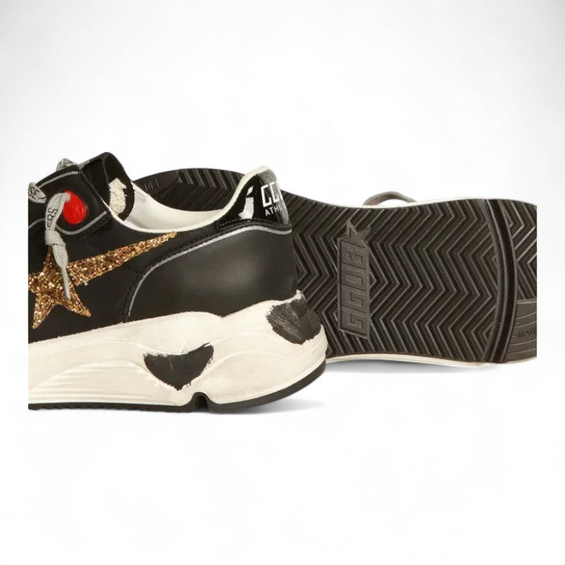 Black Running Sole sneakers with glittery gold star

