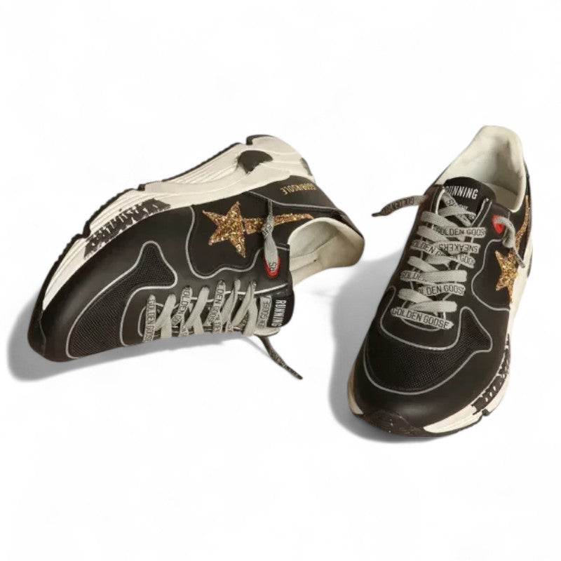 Black Running Sole sneakers with glittery gold star
