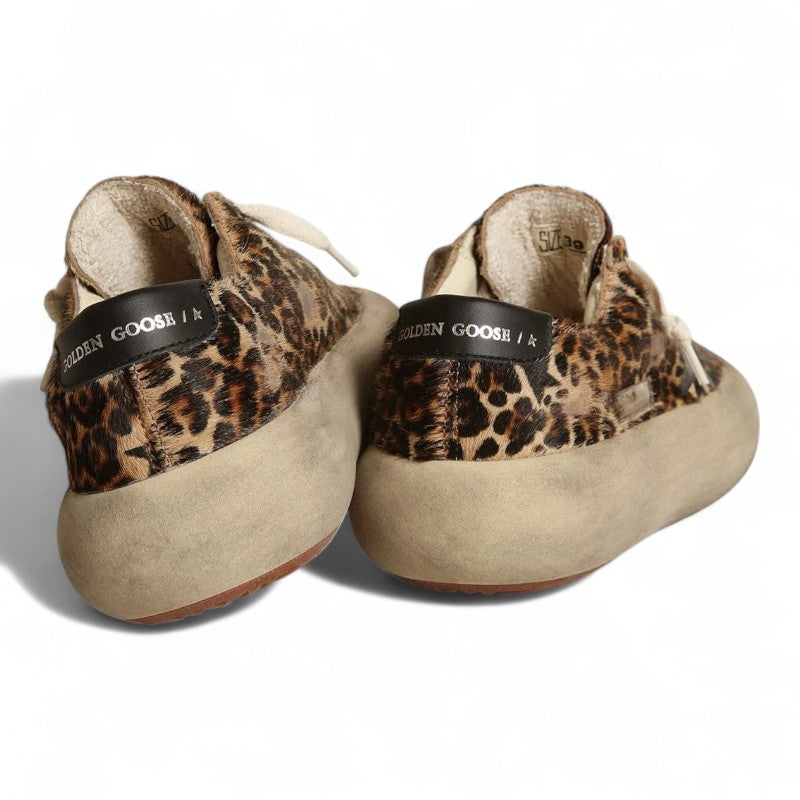 Space-Star shoes in leopard-print pony skin with black leather star and heel tab